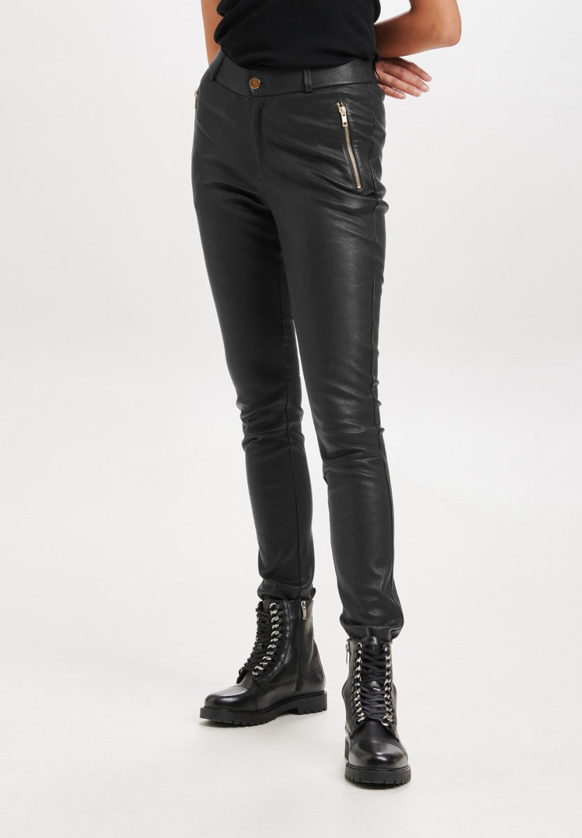 NOTYZ Leggings w saddle and zippockets Sort m Guld